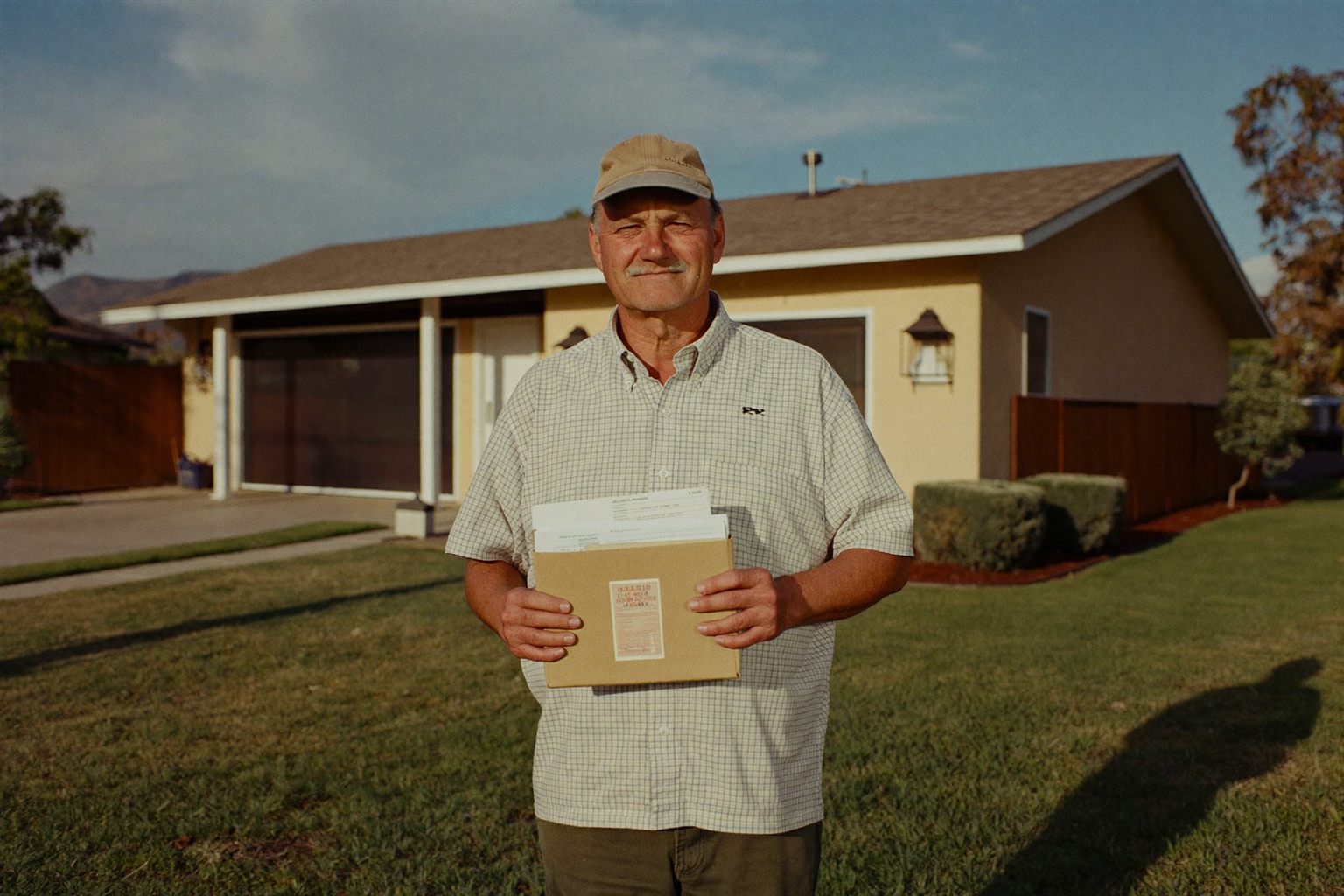 A relieved homeowner outside her house after accepting a cash offer